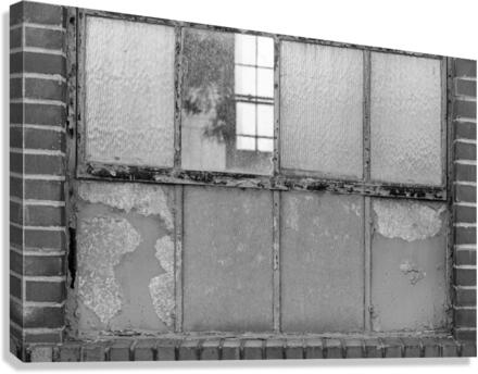 Old rusty window in warehouse in black and white Canvas Print