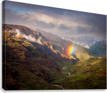 Dramatic rainbow over Waimea Canyon Canvas Print
