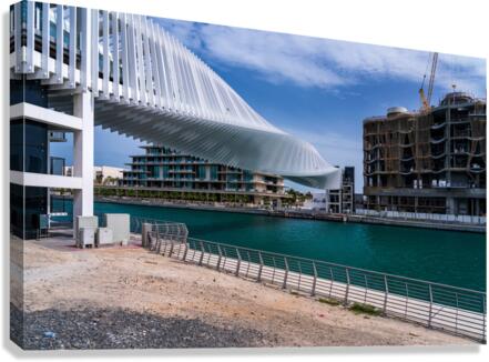 Dubai Water Canal bridge twists towards new apartment blocks Canvas Print