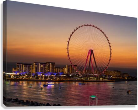 Light show on Ain Dubai observation wheel at sunset Canvas Print