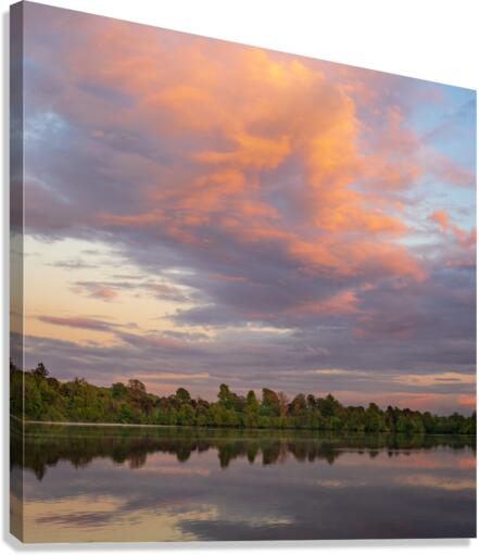 View across the Ellesmere Mere to a clear reflection of distant   Canvas Print