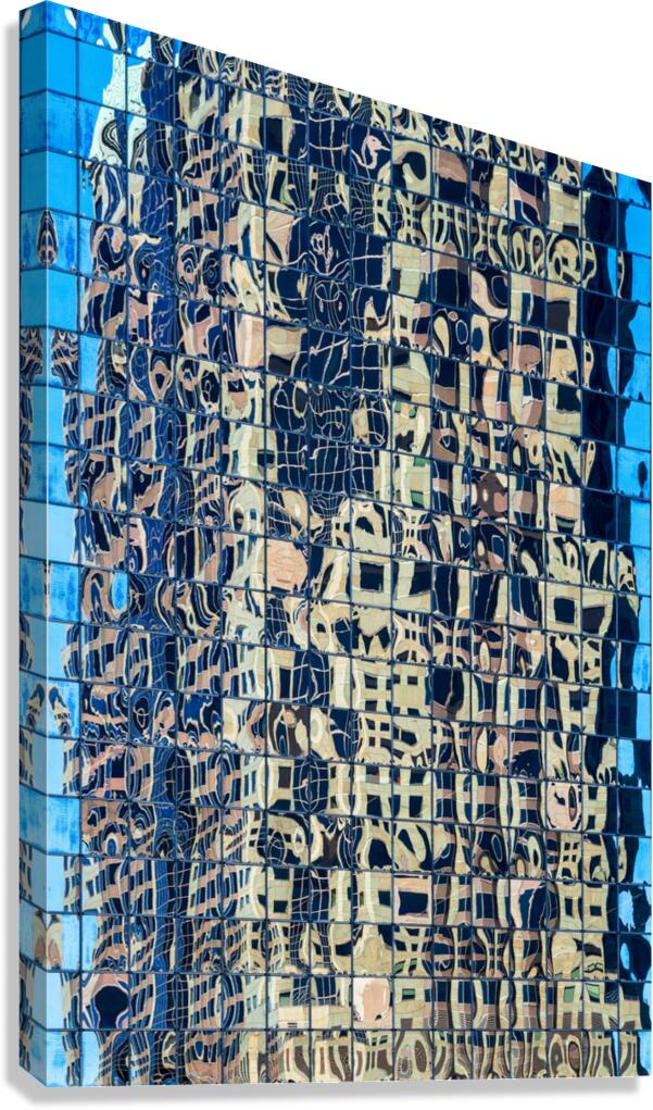 Complex reflections of a modern skyscraper in St Louis  Canvas Print