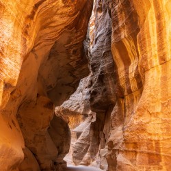 Narrow gorge of the Siq entering Petra