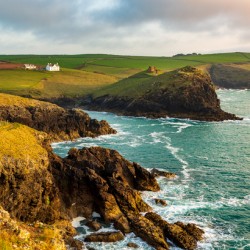 Coastline in late evening sun at Port Quin