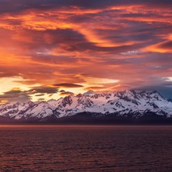 Sunset by Mt Fairweather and the Glacier Bay National Park in Al