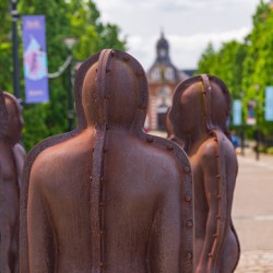 Iron scupltures of men in assembly in Royal Arsenal Riverside