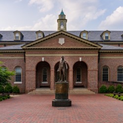 James Monroe in front of Tucker Hall at William and Mary college