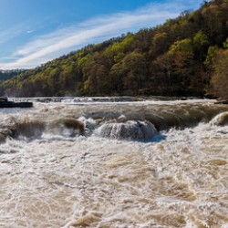 Eye level view of raging flooded Valley Falls near Fairmont