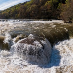 Eye level view of raging flooded Valley Falls near Fairmont