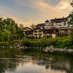 Hotel at dawn by River Wenatchee in Alpine German town of Leaven