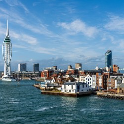 Spinnaker tower overlooks the harbor at Portsmouth with luxury y