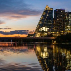 Sail like building with modern office blocks in Austin Texas sky