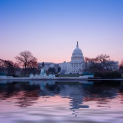 Sunrise behind the dome of the Capitol in DC