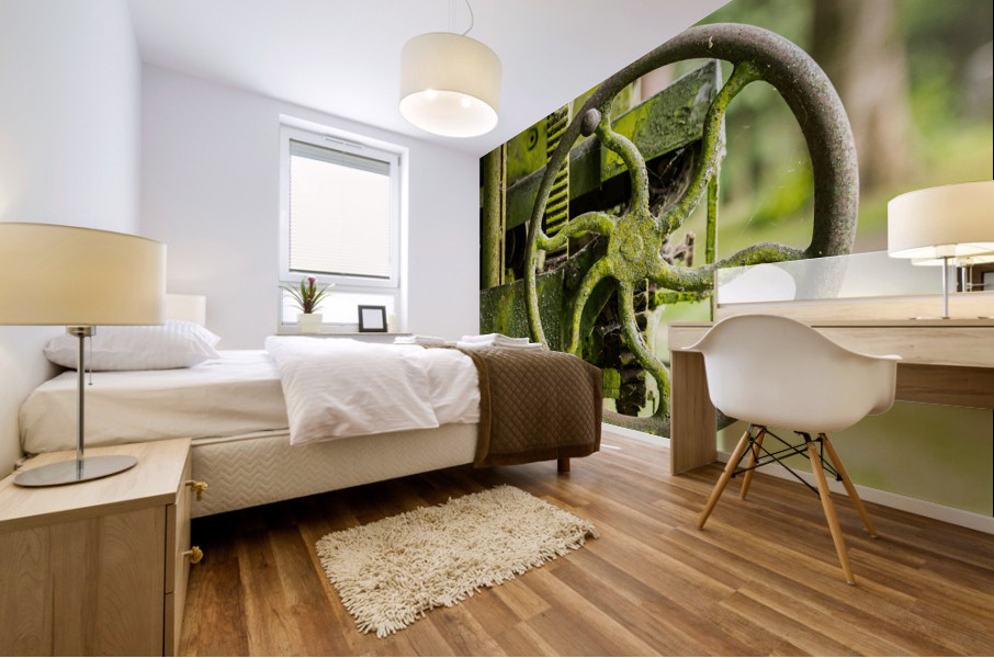 Moss covered farm machinery with handle Mural print