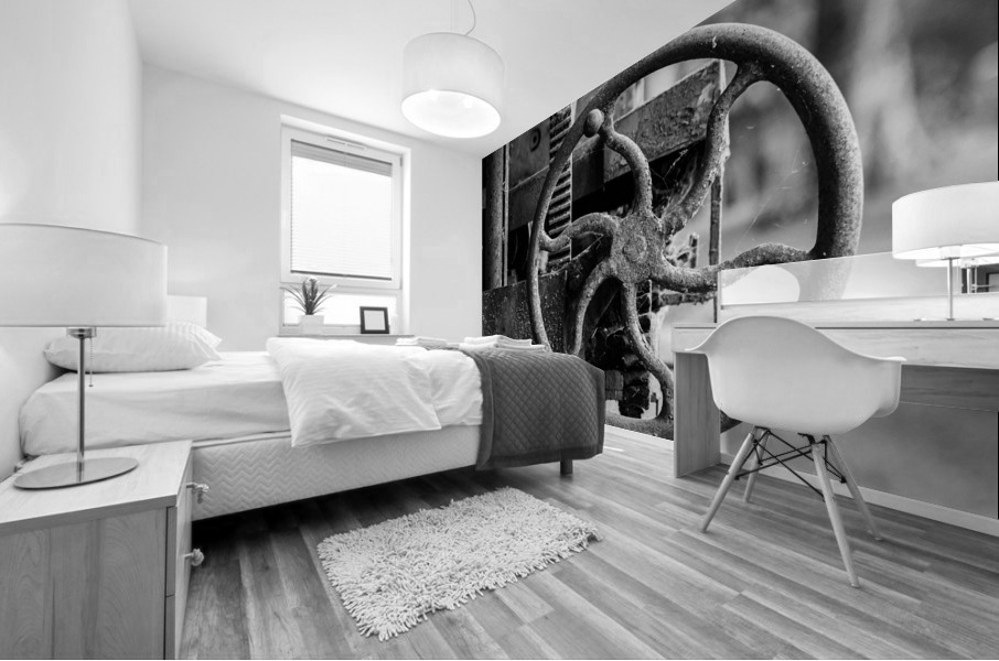 Moss covered farm machinery with handle Mural print