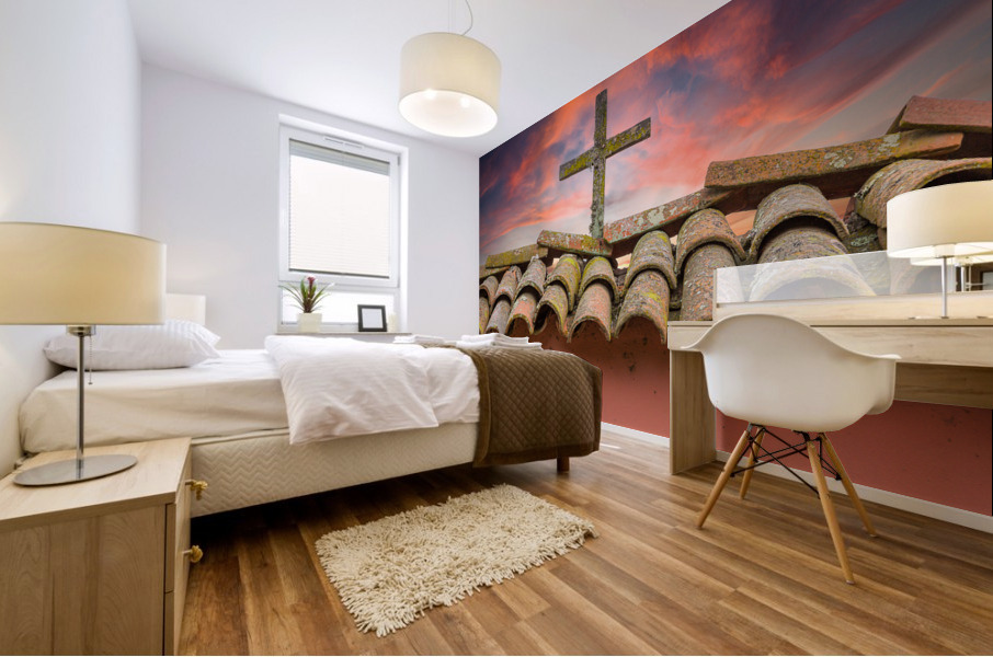 Wooden cross against brilliant sunrise at mission in California Mural print