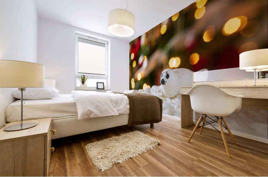 Seal on Christmas cake with tree lights Mural print