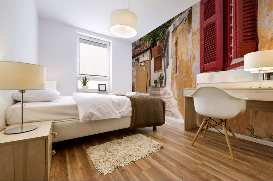 Narrow street in ancient district of Anafiotika Mural print