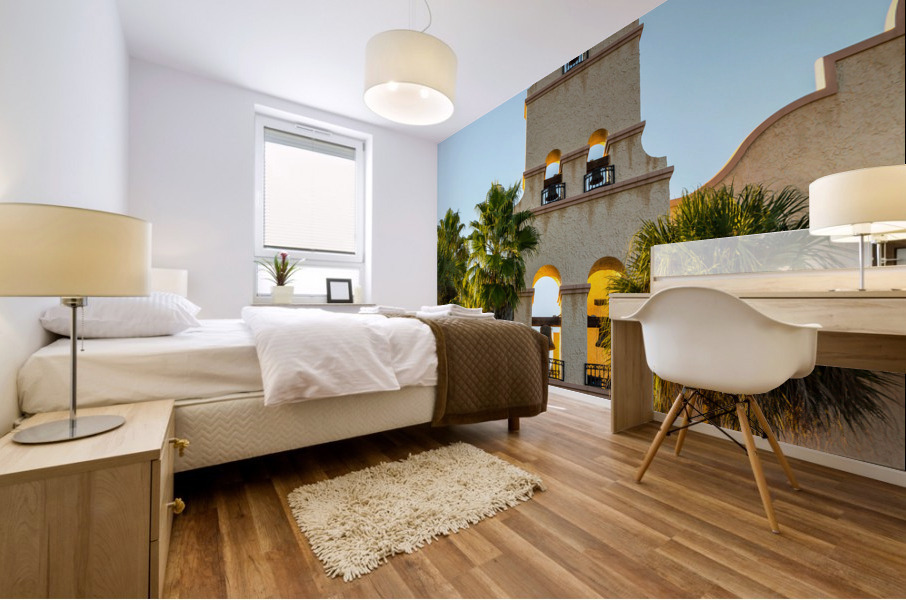 Spanish mission style church tower at sunset Mural print