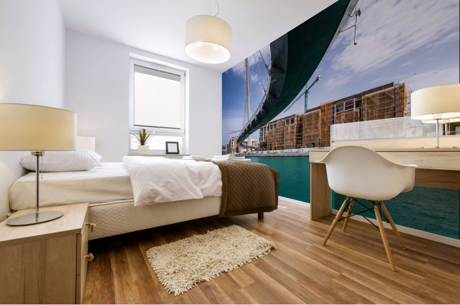 Modern apartments alongside Dubai Canal under Tolerance bridge Mural print