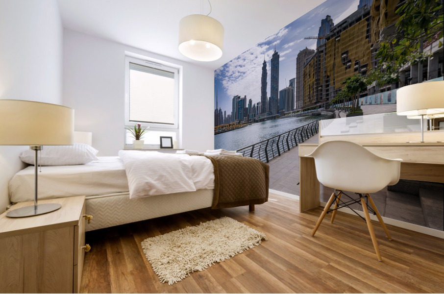 Low rise homes in front of modern apartments of Dubai Downtown d Mural print