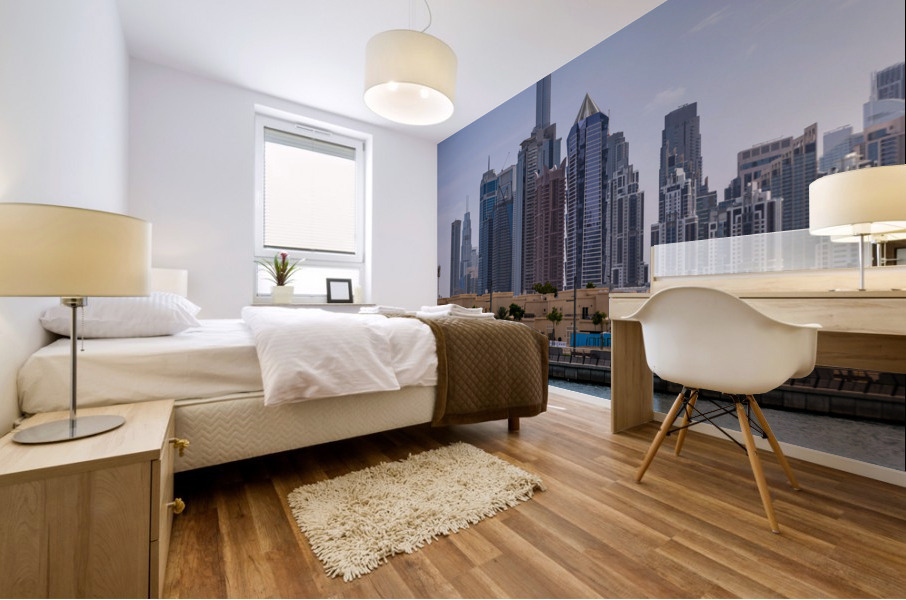 Low rise homes in front of modern apartments of Dubai Downtown d Mural print