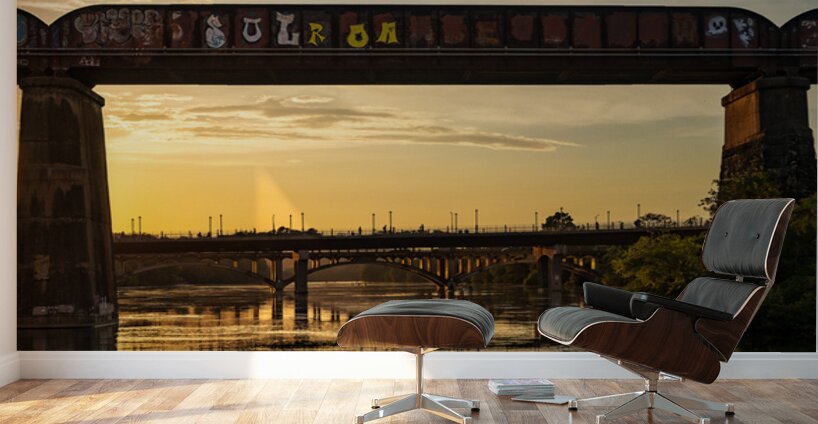 Bridges behind the railroad bridge in Austin at sunset Wall Murals