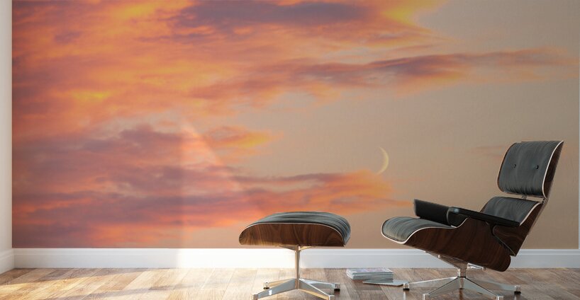 Fiery sunset clouds enveloping the new crescent moon over Lake C Wall Murals