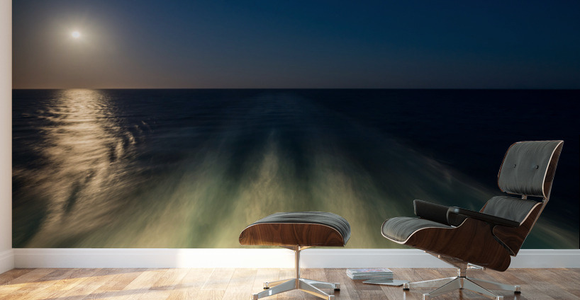 Moon over the wake of cruise ship travelling at speed Wall Murals