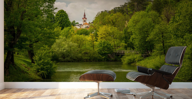 Church in the woods above peaceful river Wall Murals