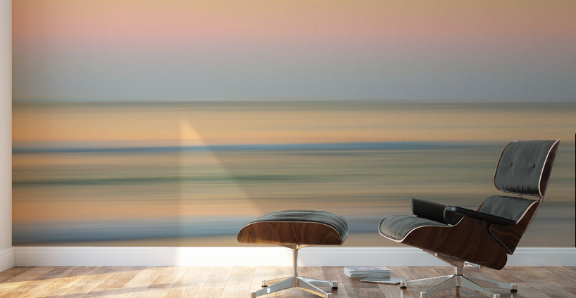 Sunrise over ocean with sideways pan Wall Murals