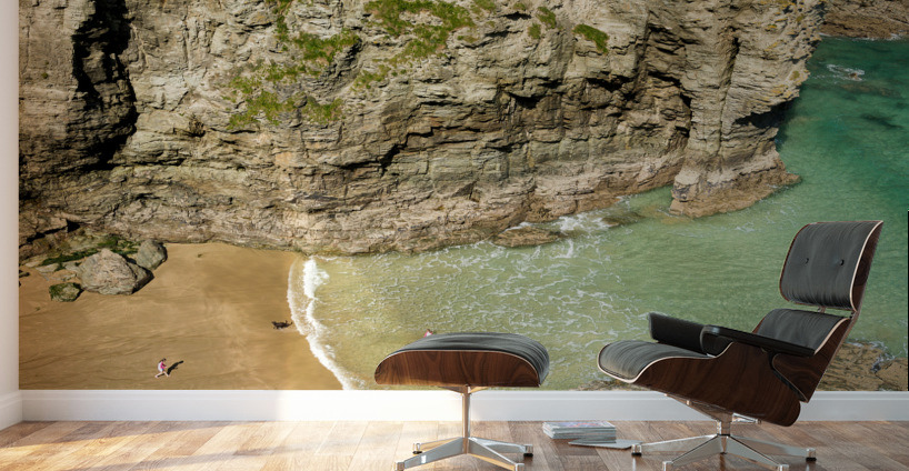Children playing on beach near Tintagel in Cornwall Wall Murals