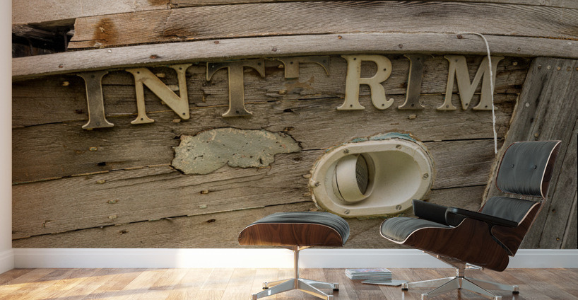 Detail of abandoned fishing boat by ocean at Icy Strait Point Wall Murals