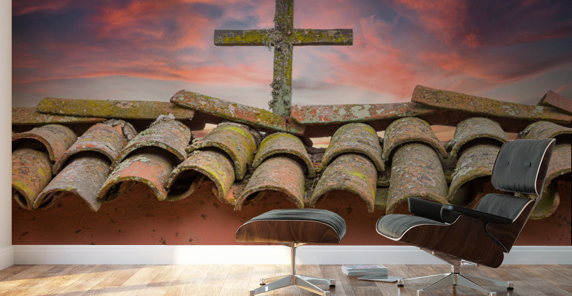 Wooden cross against brilliant sunrise at mission in California Wall Murals