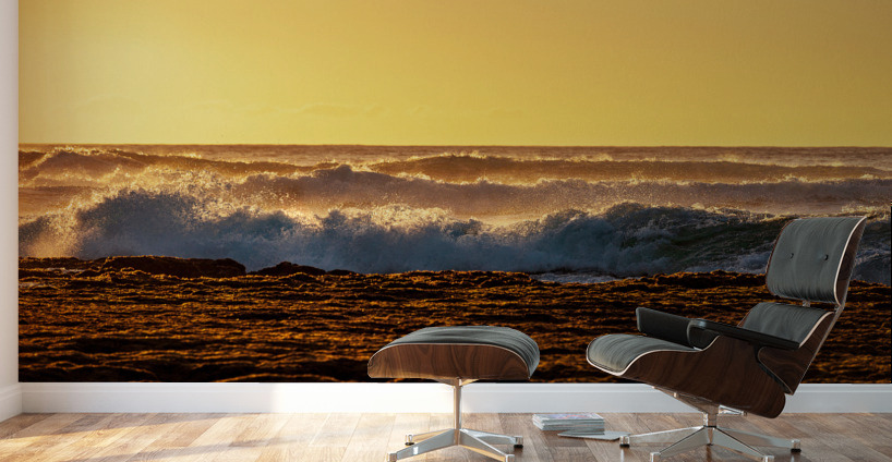 Setting sun lights crashing waves Wall Murals