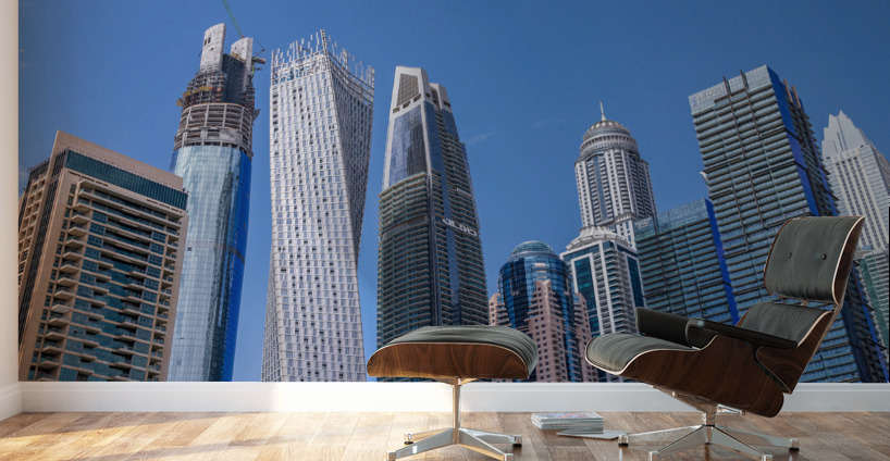 Cayan Tower among tall buildings on waterfront at Dubai Marina Wall Murals