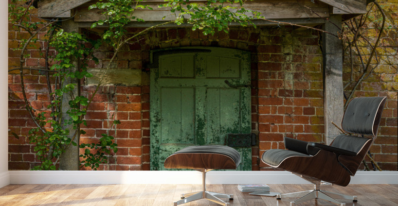 Painted green door and porch in walled garden wall Wall Murals