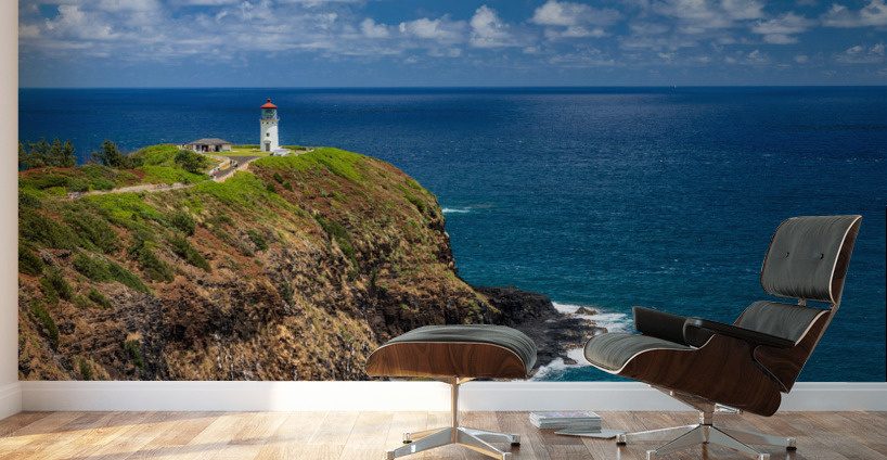 Kilauea lighthouse on headland against blue sky on Kauai Wall Murals