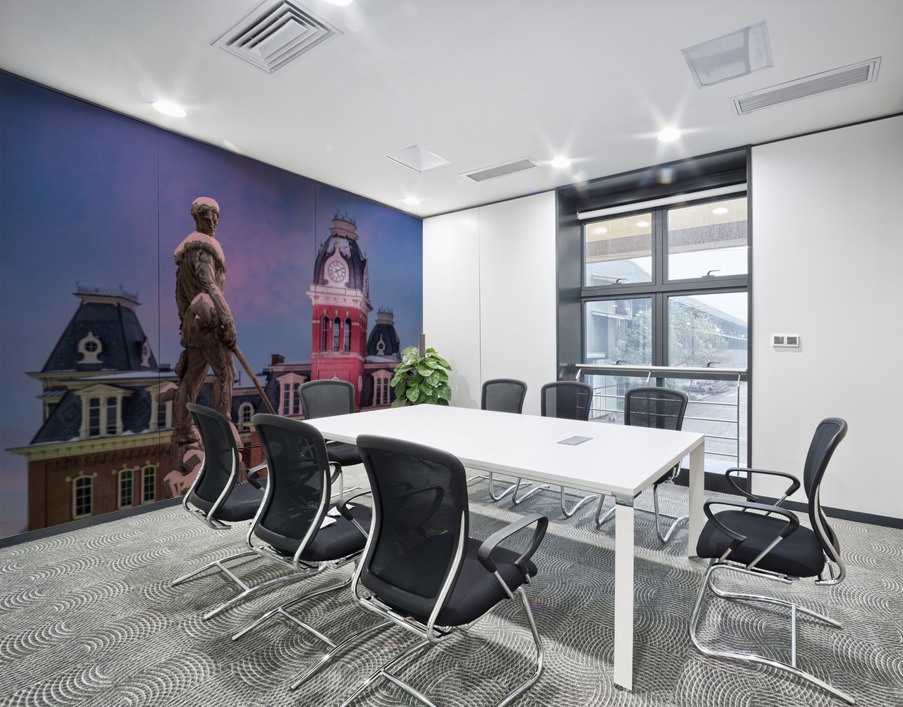 Mountaineer statue against Woodburn Hall tower Wall Printing