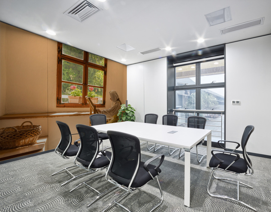 Woman working on embroidery in window alcove Wall Printing