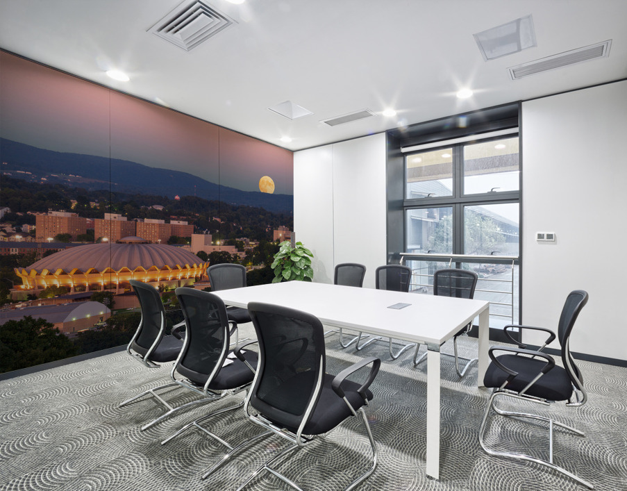 Moon rising above the Coliseum at WVU Wall Printing