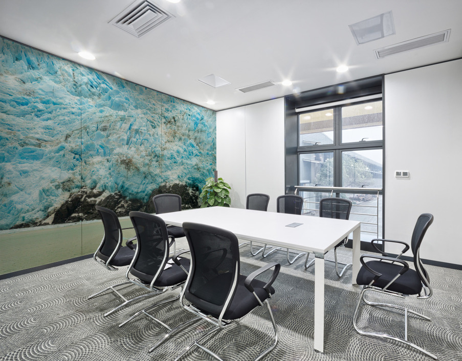 Amalia Glacier towers over large rocks and trees in Patagonia Wall Printing
