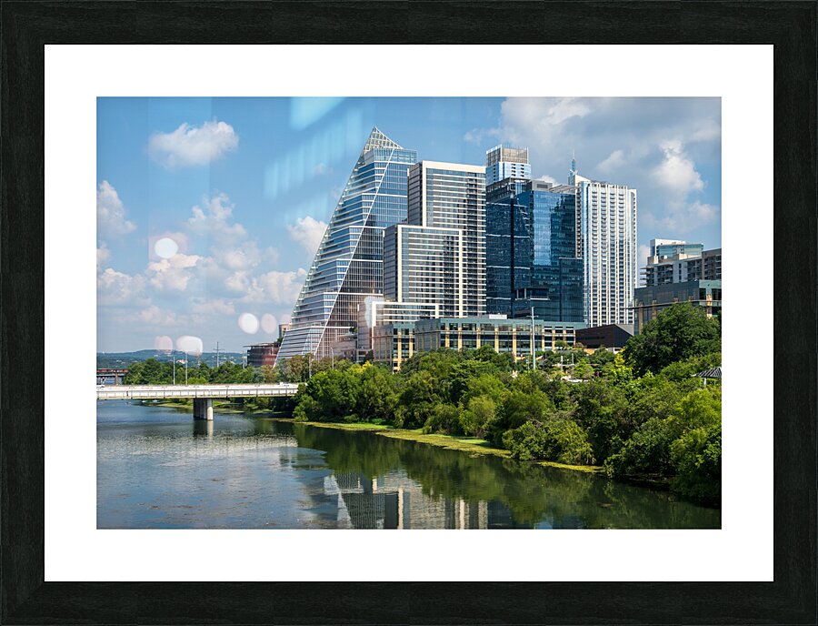 Cityscape of apartments in Austin Texas across Lady Bird Lake Picture Frame print