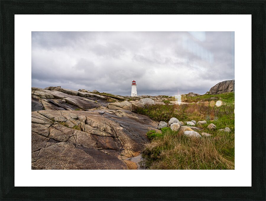Famous Peggys Cove lightouse near Halifax in Nova Scotia Canada Picture Frame print