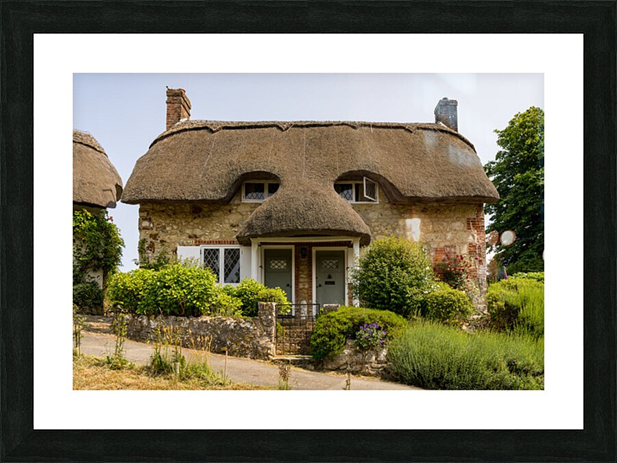 Pair of cute thatched cottages on hill in Godshill on the Isle o Picture Frame print