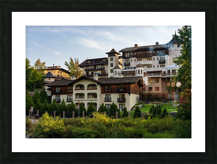 Posthotel by River Wenatchee in Alpine German town of Leavenwort Picture Frame print
