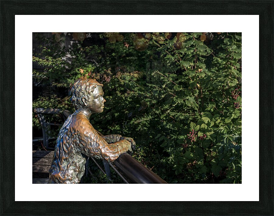 Boy with dog statue in Langley on Whidbey Island Picture Frame print