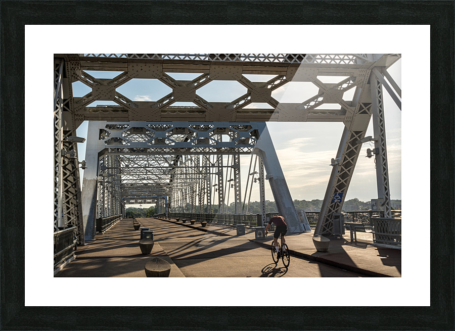 Cyclist on John Seigenthaler pedestrian bridge or Shelby street crossing Picture Frame print