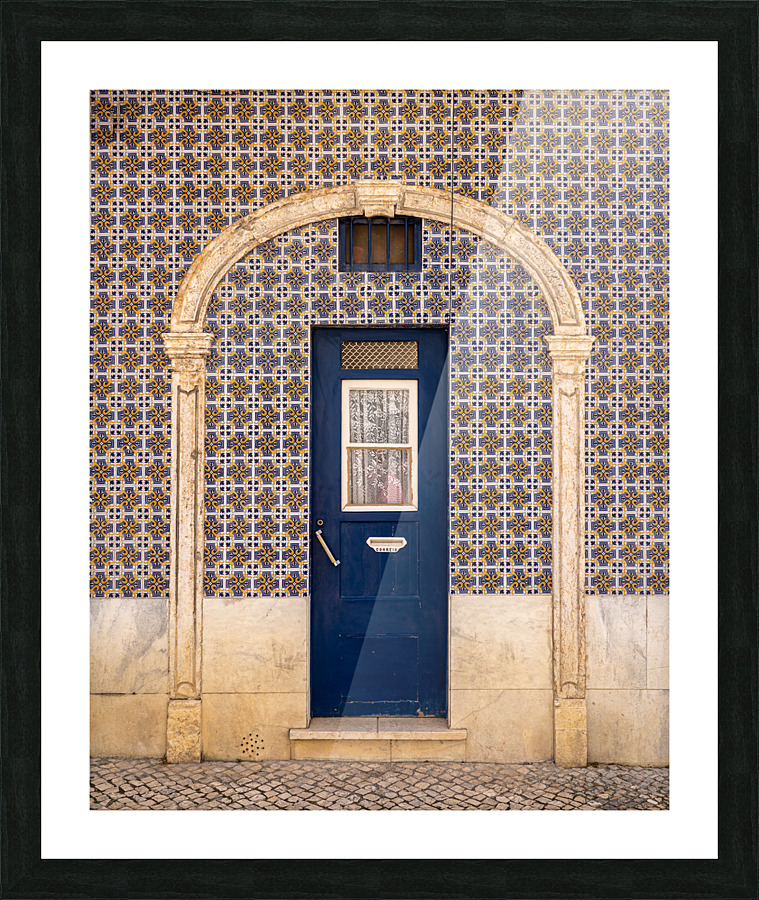 Blue door in ceramic tiled home in Lisbon Picture Frame print