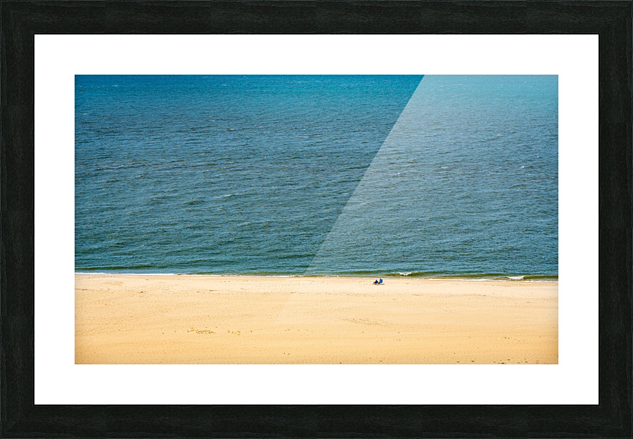 Single couple on wide beach at Cape May Point Picture Frame print